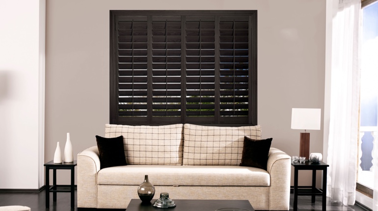 San Jose sunroom with black shutters.